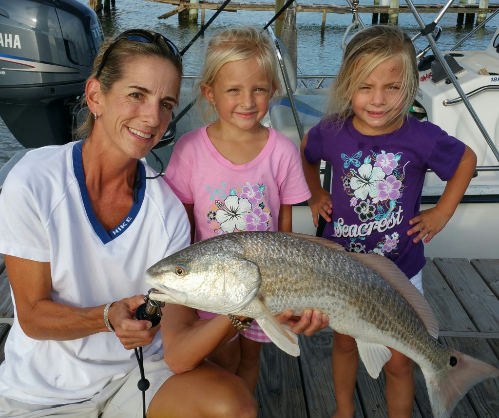 Mother & Daughters with Fish on Galveston Island