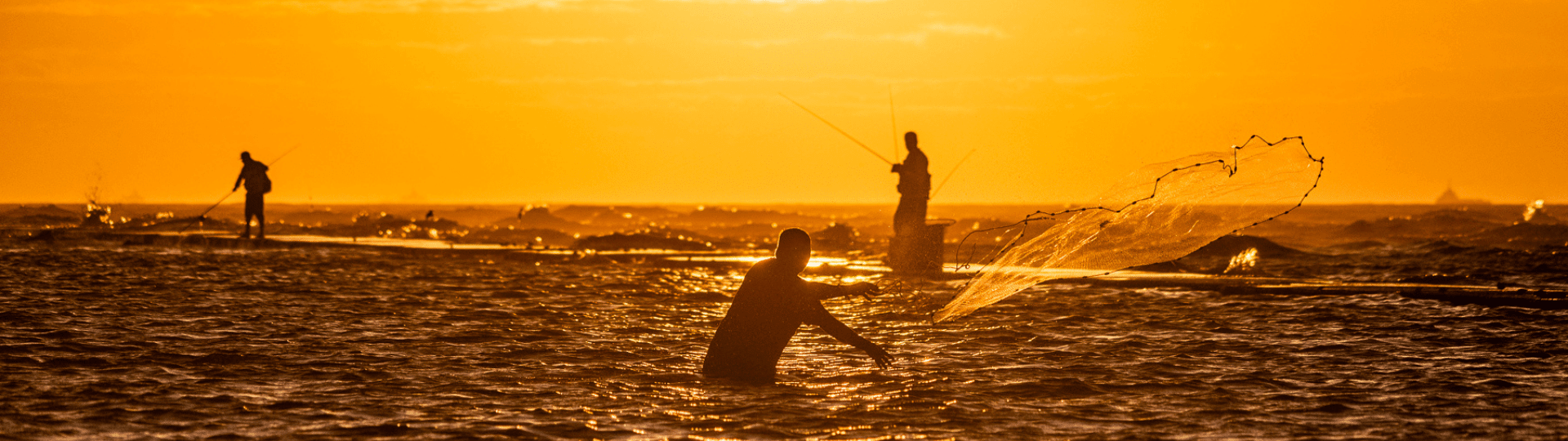 Fishing at sunset in Galveston tx