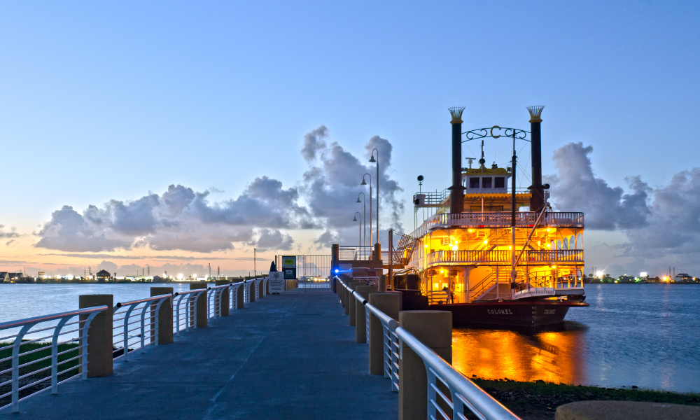 Colonel Paddlewheel boat at dock in Galveston at dusk.